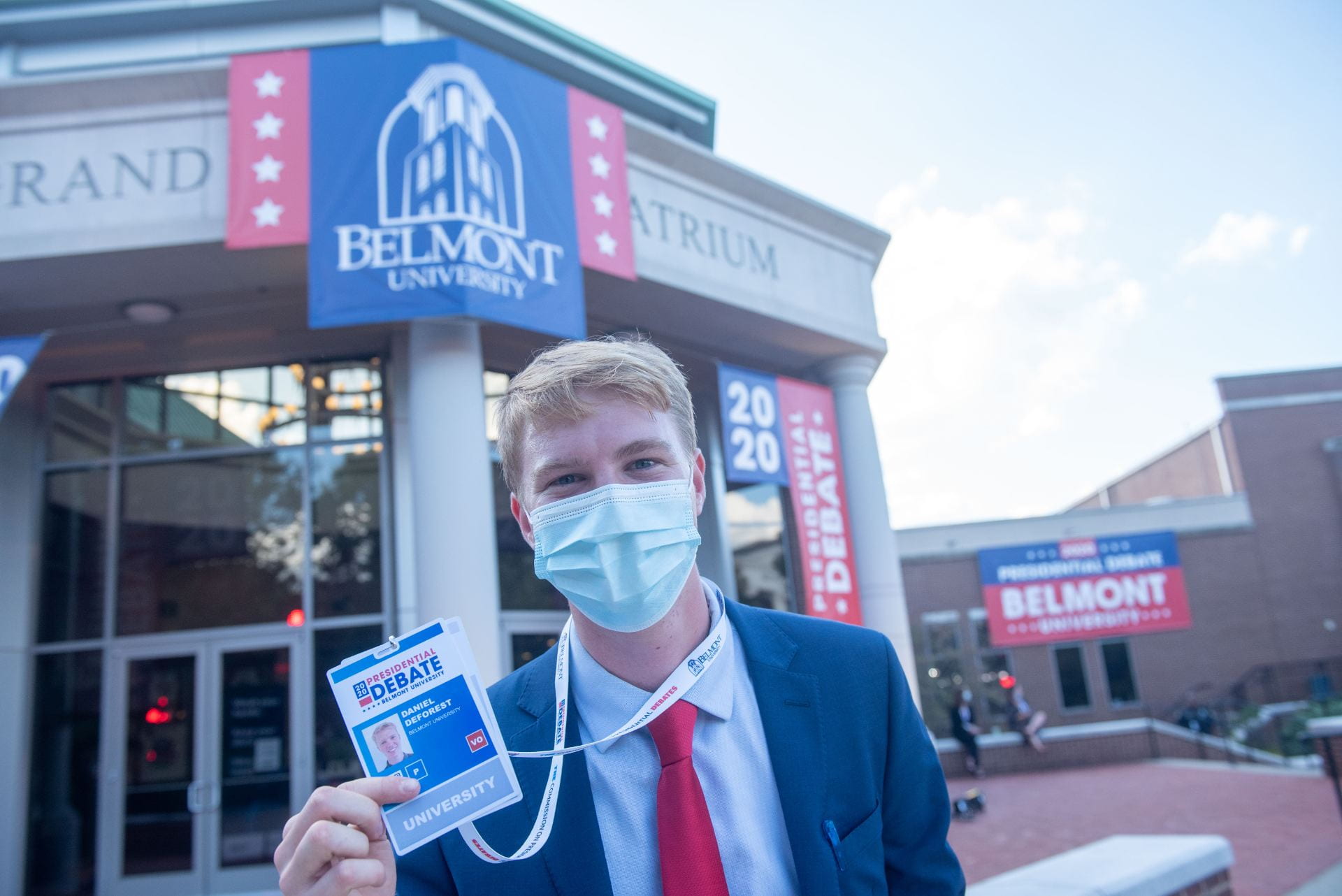 Belmont student Daniel (Danny) Deforest shows off is pass in front of Debate Hall