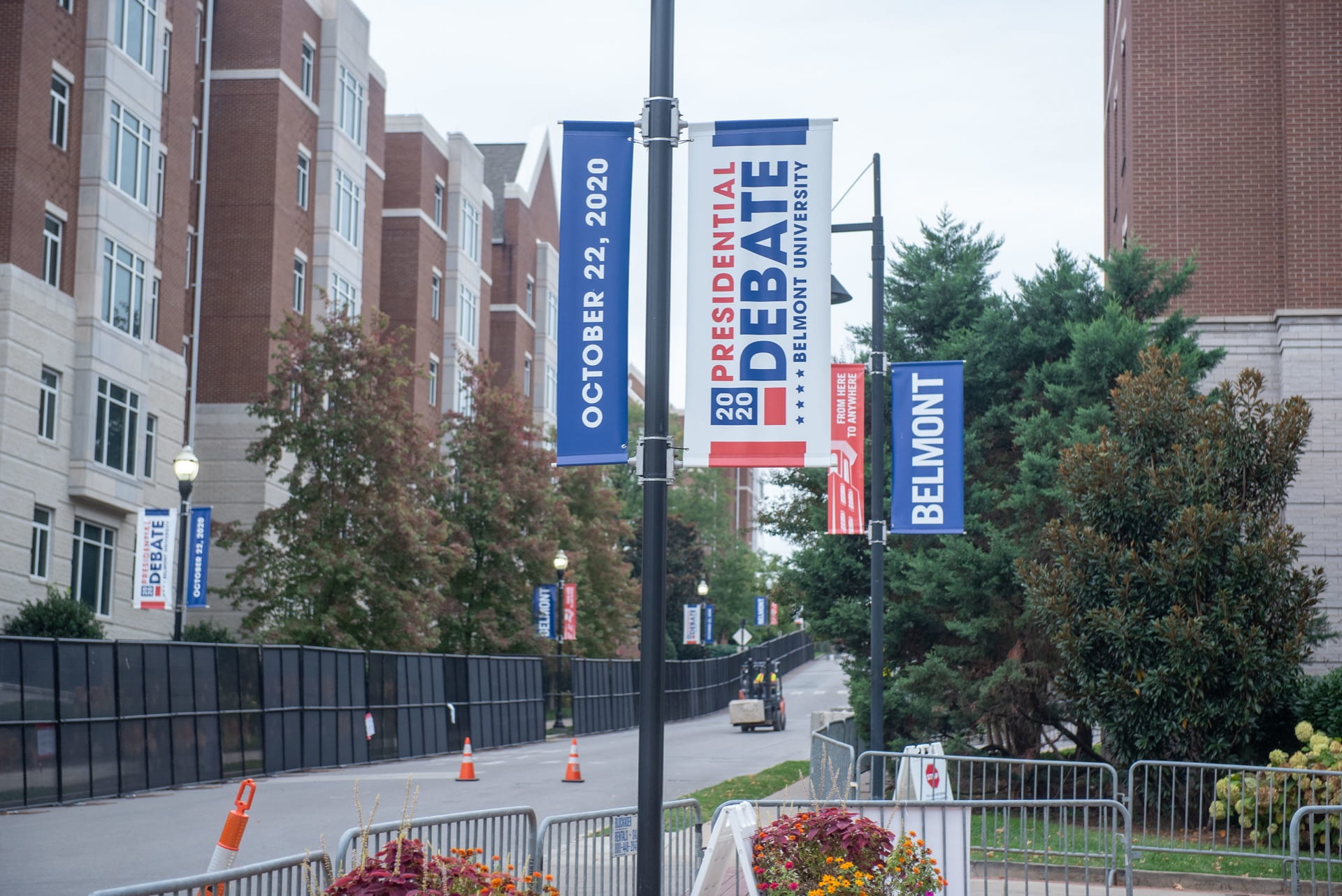 2020 Debate banners and security fencing around the student dorms and the Johnson center